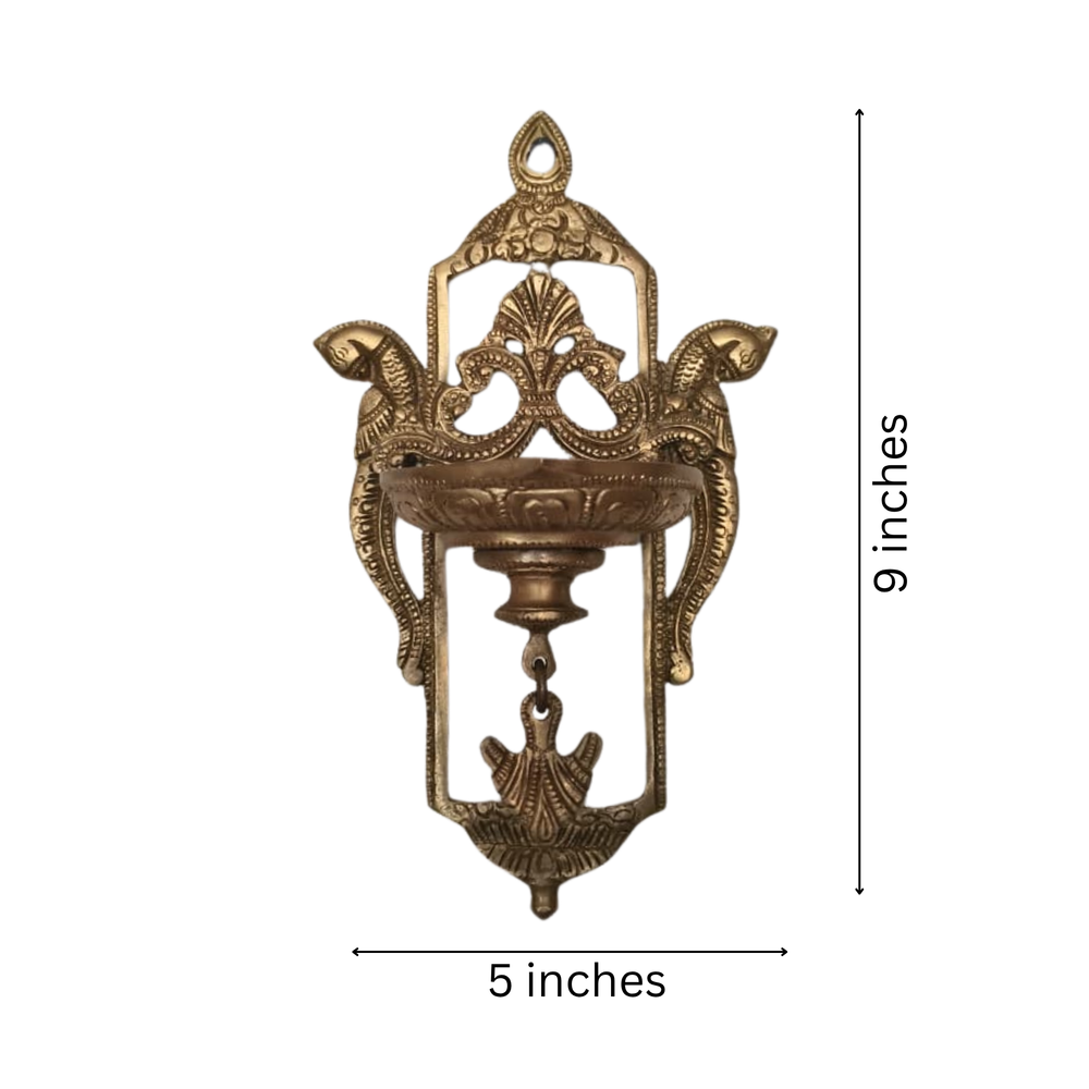 Traditional Brass Peacock Wall Diya – Handcrafted Hanging Oil Lamp   Brass Artwork