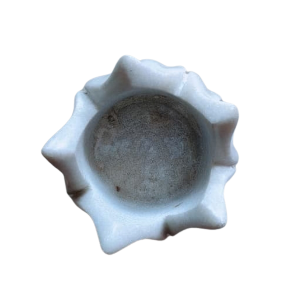 Natural marble lotus tealight holder for serene home ambiance.