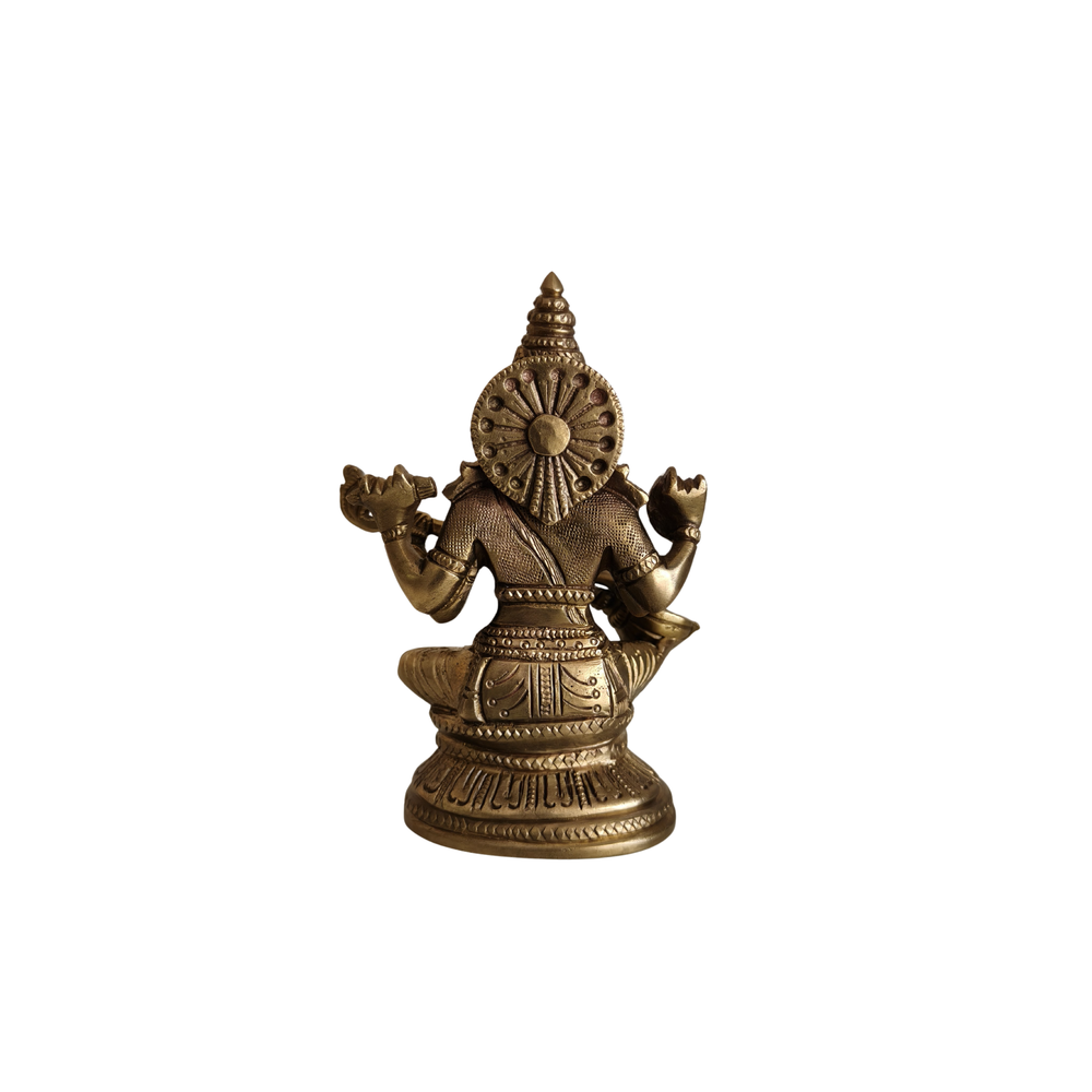 Handcrafted brass saraswati statue for pooja decor.