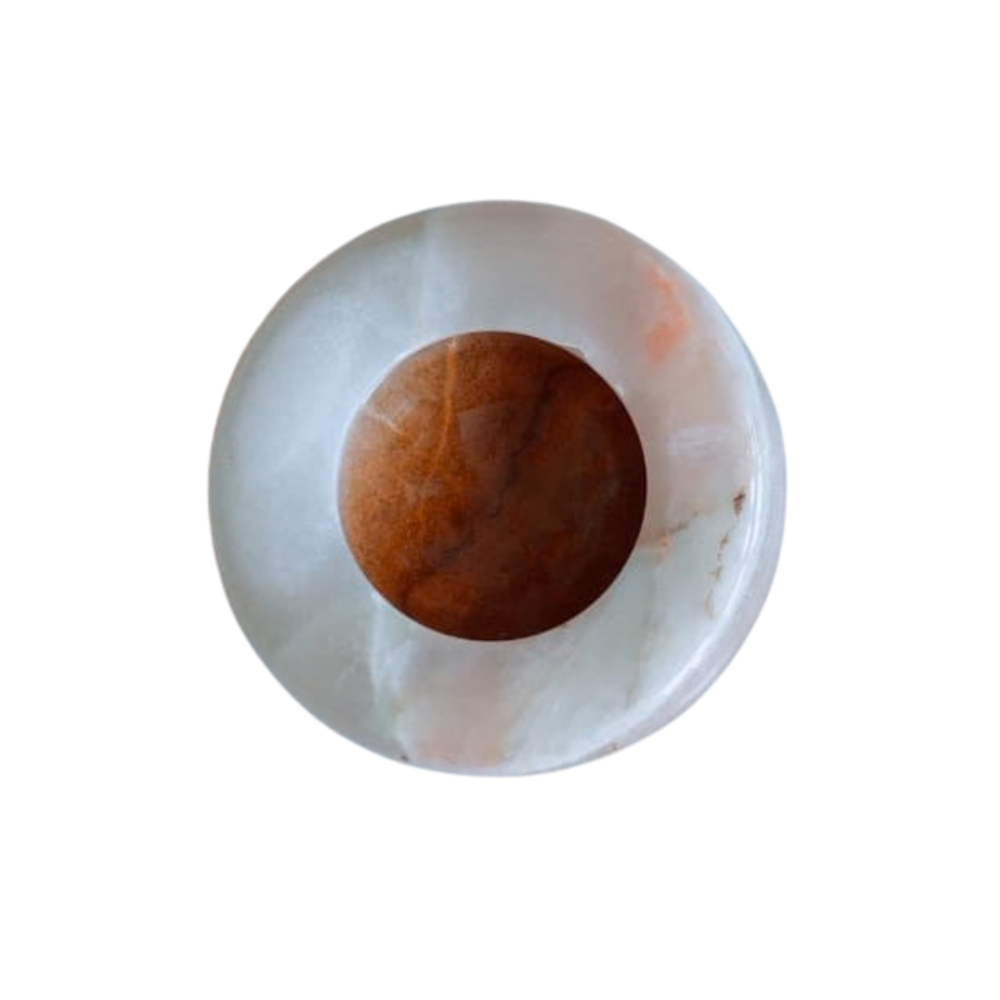 Natural onyx smoking ashtray with smooth glossy surface.