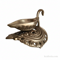 Brass Handheld Diya | Traditional Ritual Oil Lamp with Swan Handle and Ornate Base   Brass Artwork
