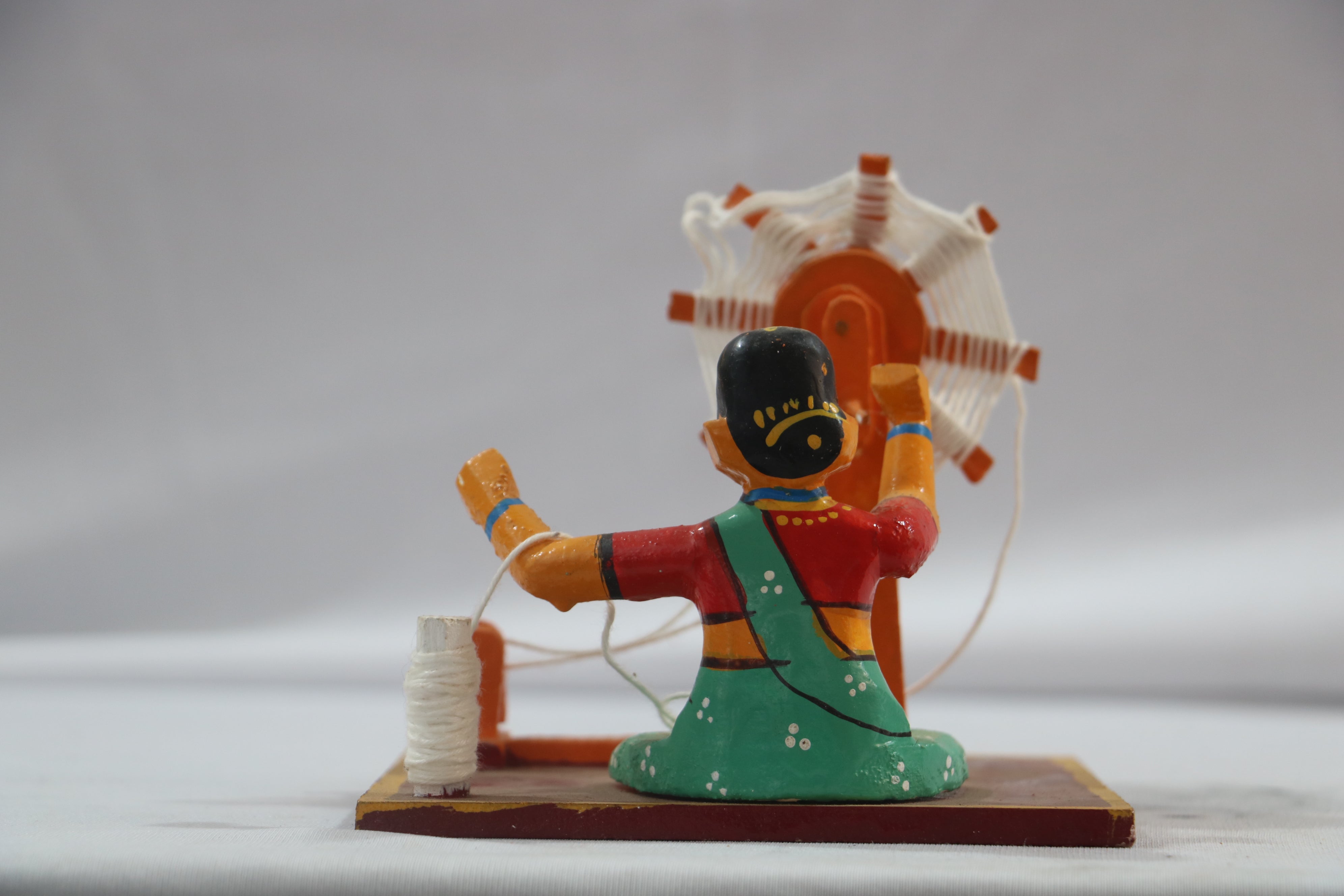 Channapatna Handicraft – Lady Weaving Thread Figurine (Wooden Toy/Decor)