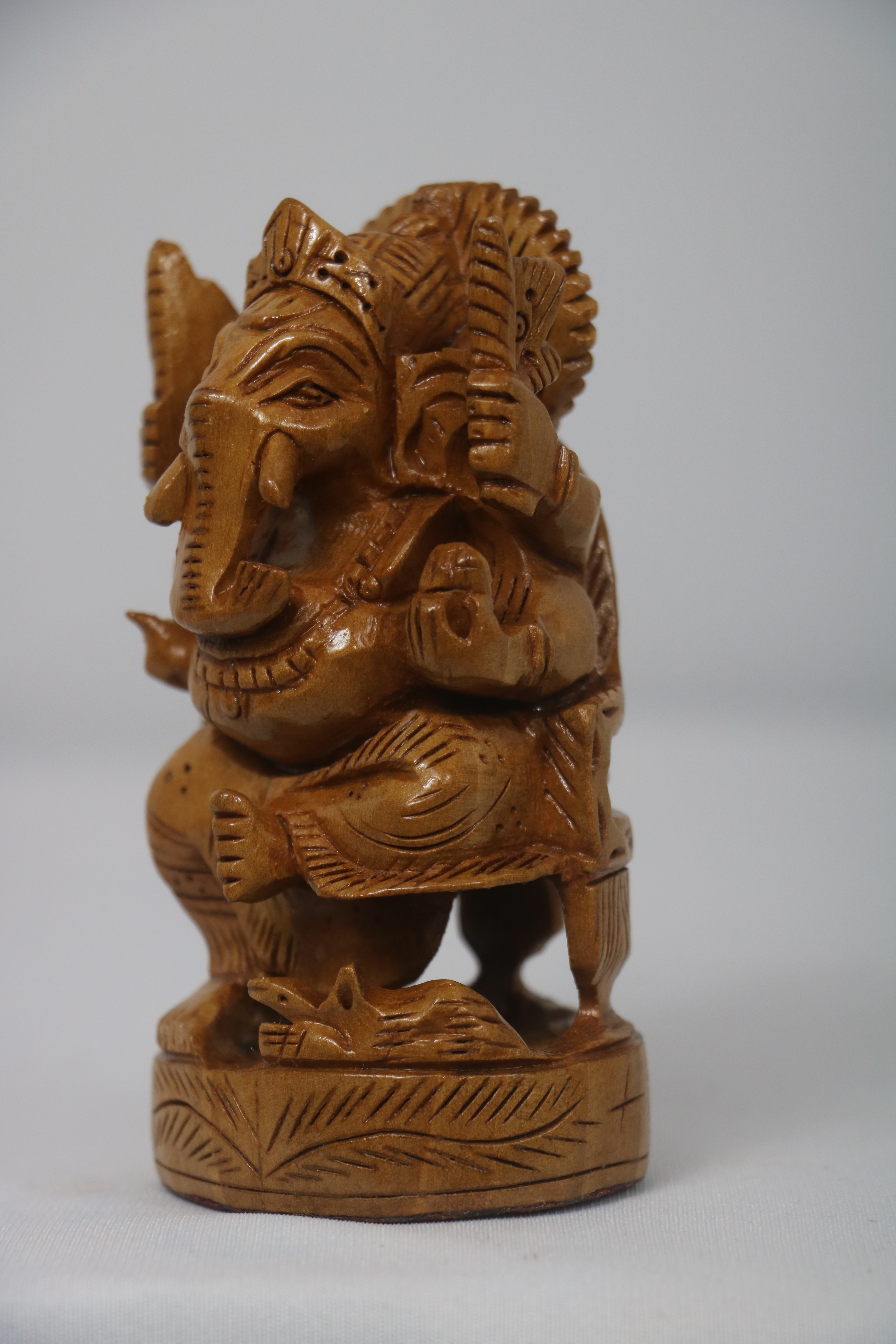 Wooden Ganesh Sitting In Chair