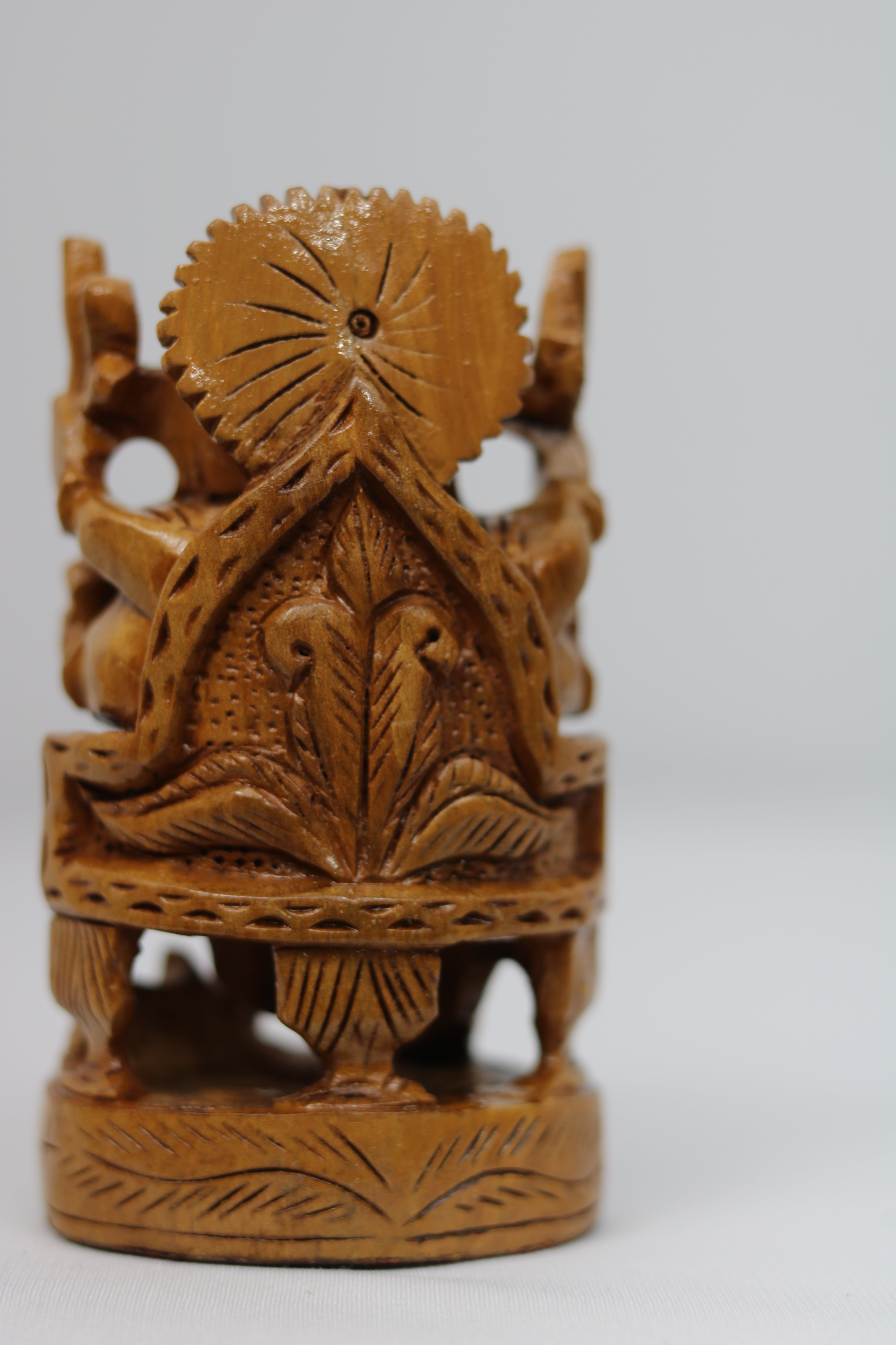 Wooden Ganesh Sitting In Chair