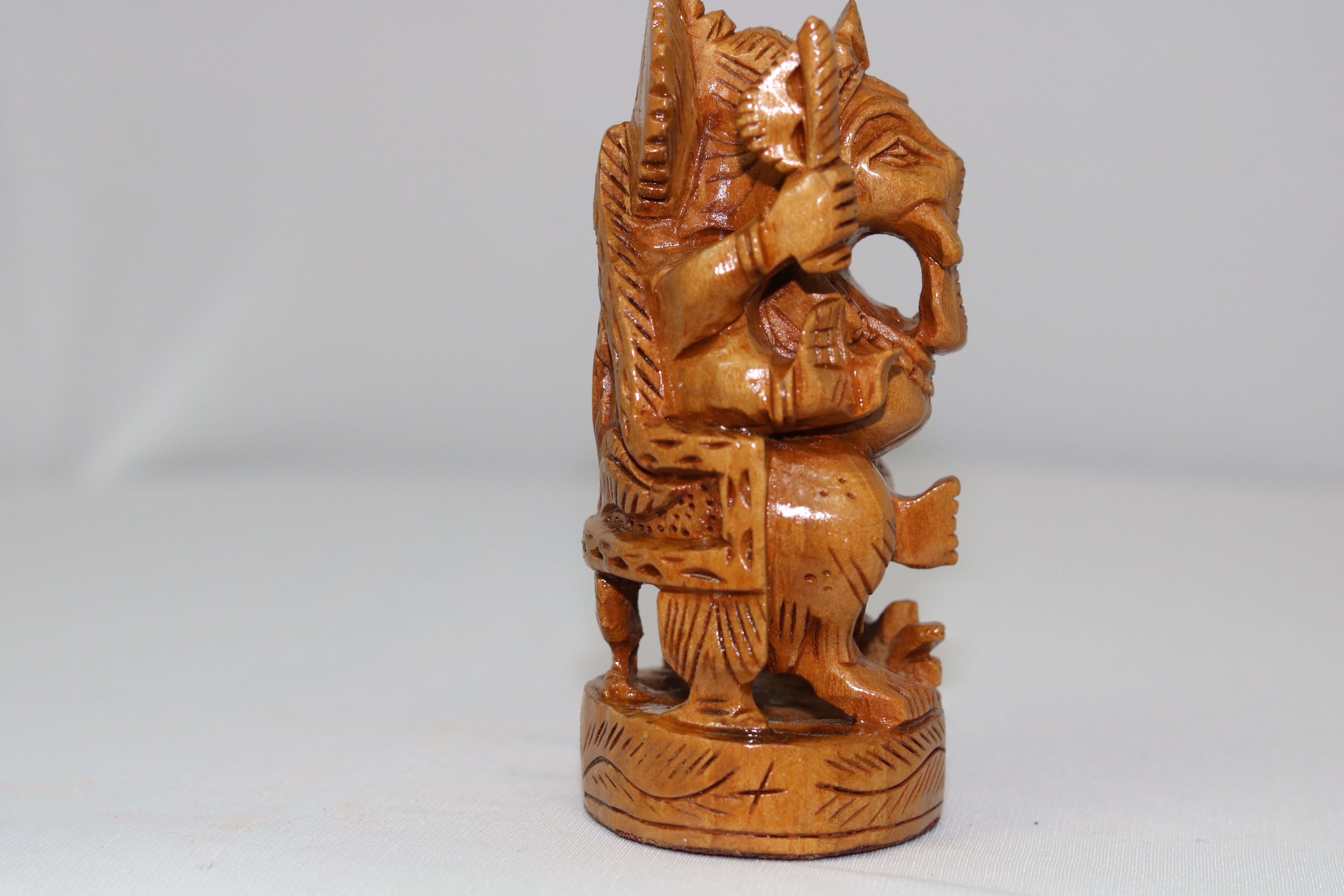 Wooden Ganesh Sitting In Chair