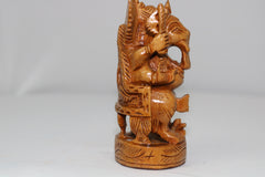 Wooden Ganesh Sitting In Chair