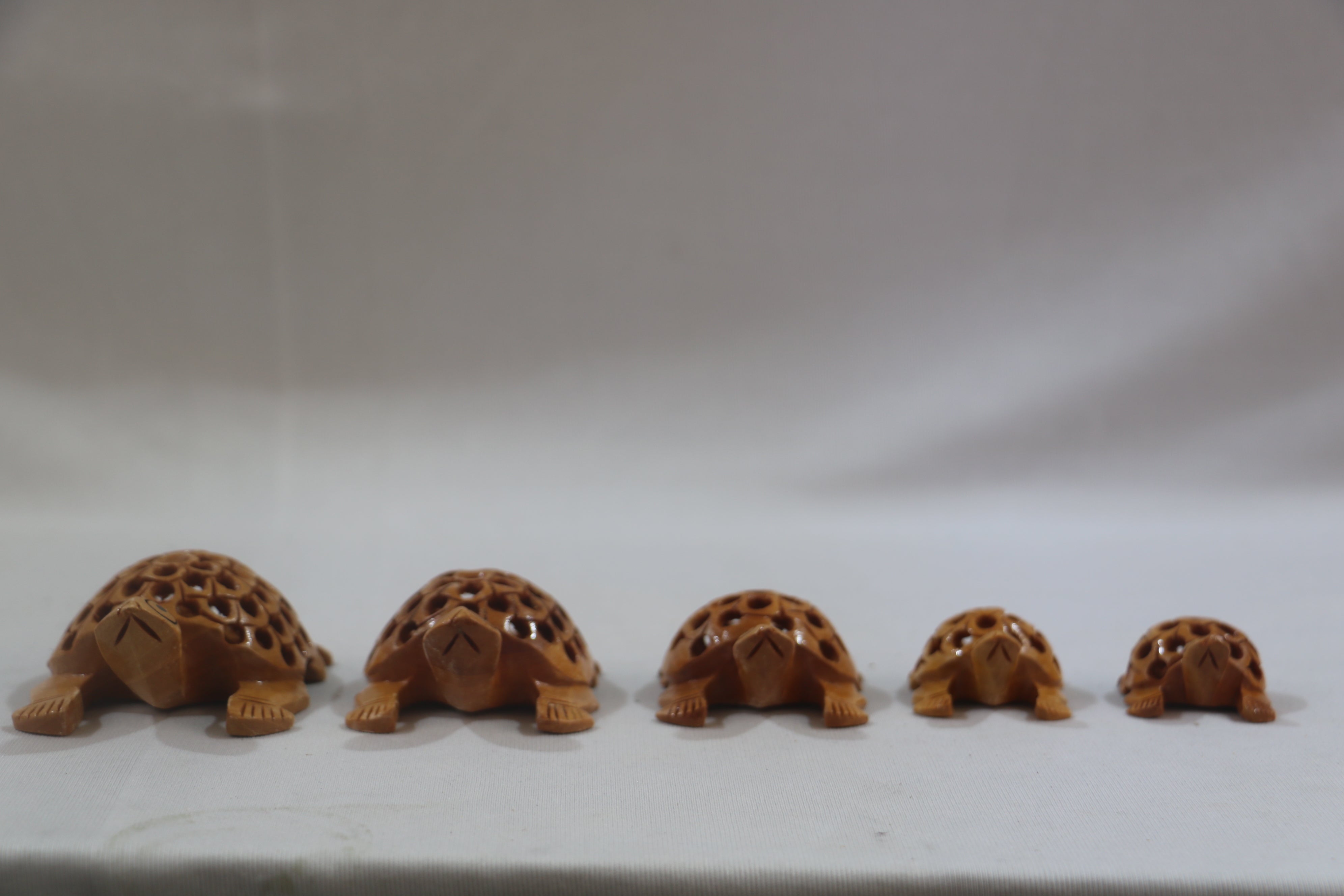 Wooden Jali Tortoise Family – Artisan Carved Traditional Home Decor