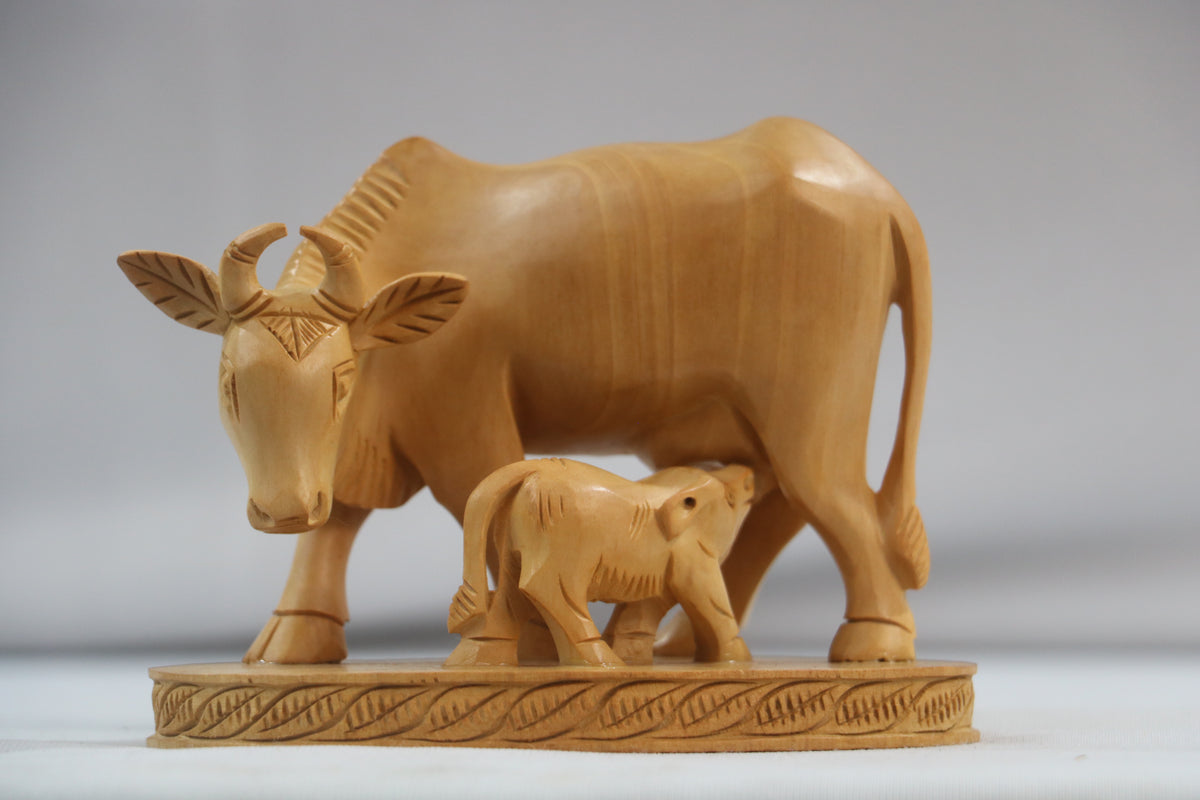 Hand-Carved Wooden Cow with Calf