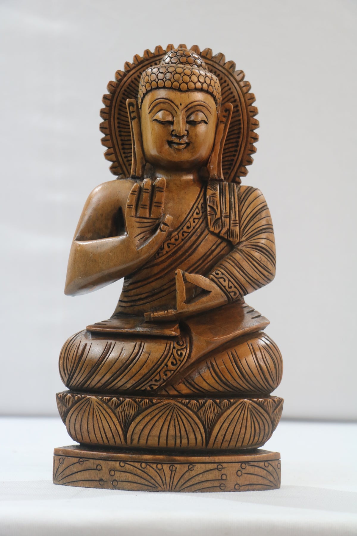 Hand-Carved Wooden Buddha Sitting In Lotus Decorative Background Panel