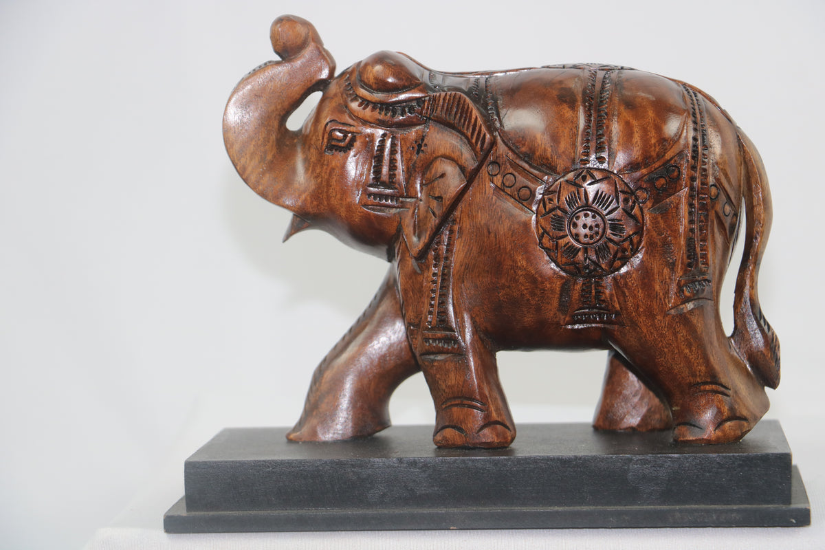Hand-Carved Wooden Elephant with Base – Elegant Decorative Figurine