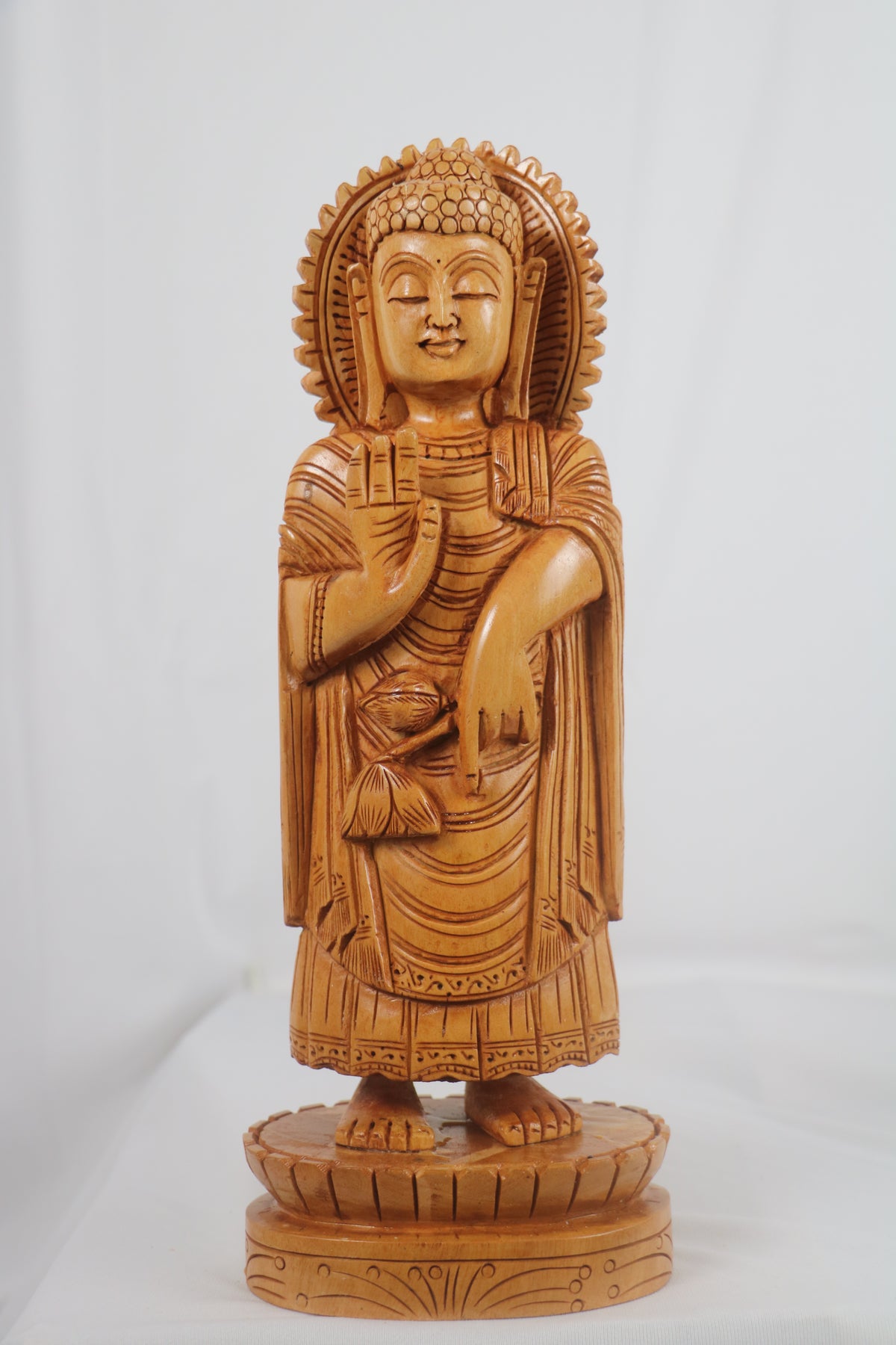 Wooden Carved Standing Buddha Head Background