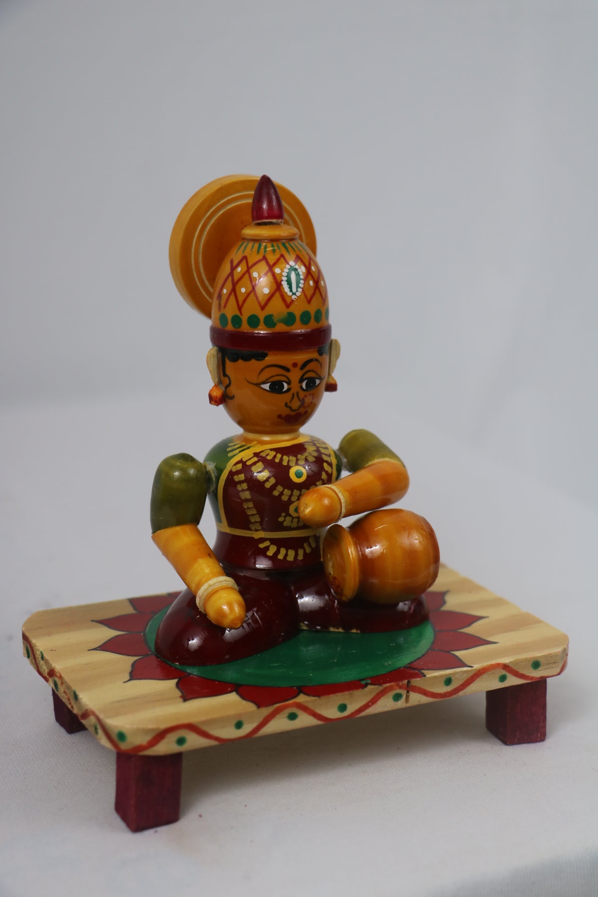 Devi Eating Sitting on Base