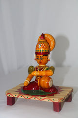 Devi Eating Sitting on Base