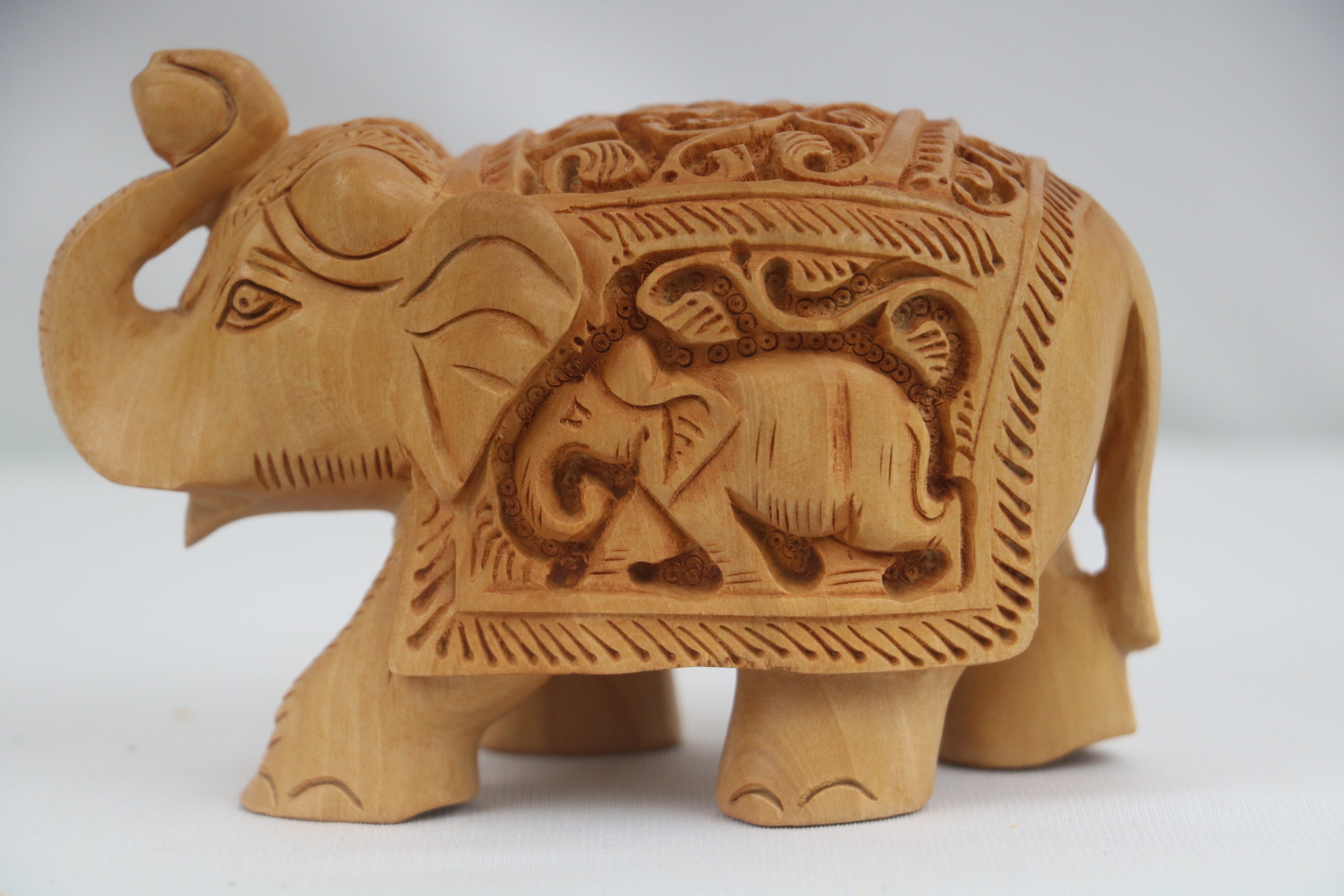 Hand-Carved Wooden Elephants – Artisan Decorative Sculptures