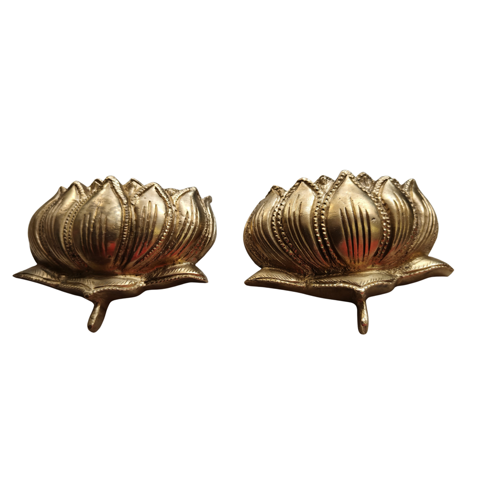 Brass lotus altar set with two sacred flower pieces for home decor.