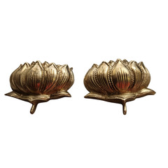 Brass lotus altar set with two sacred flower pieces for home decor.