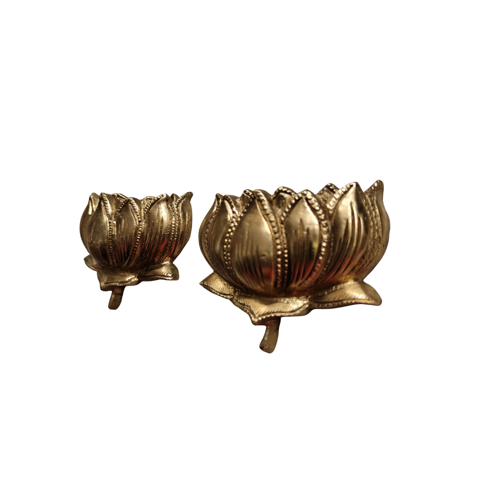 Brass lotus altar set with two sacred flower holders for home altar decor.