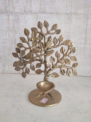 Elegant brass kalpavriksha with diya home accent decor piece showcasing intricate detailing and traditional design.