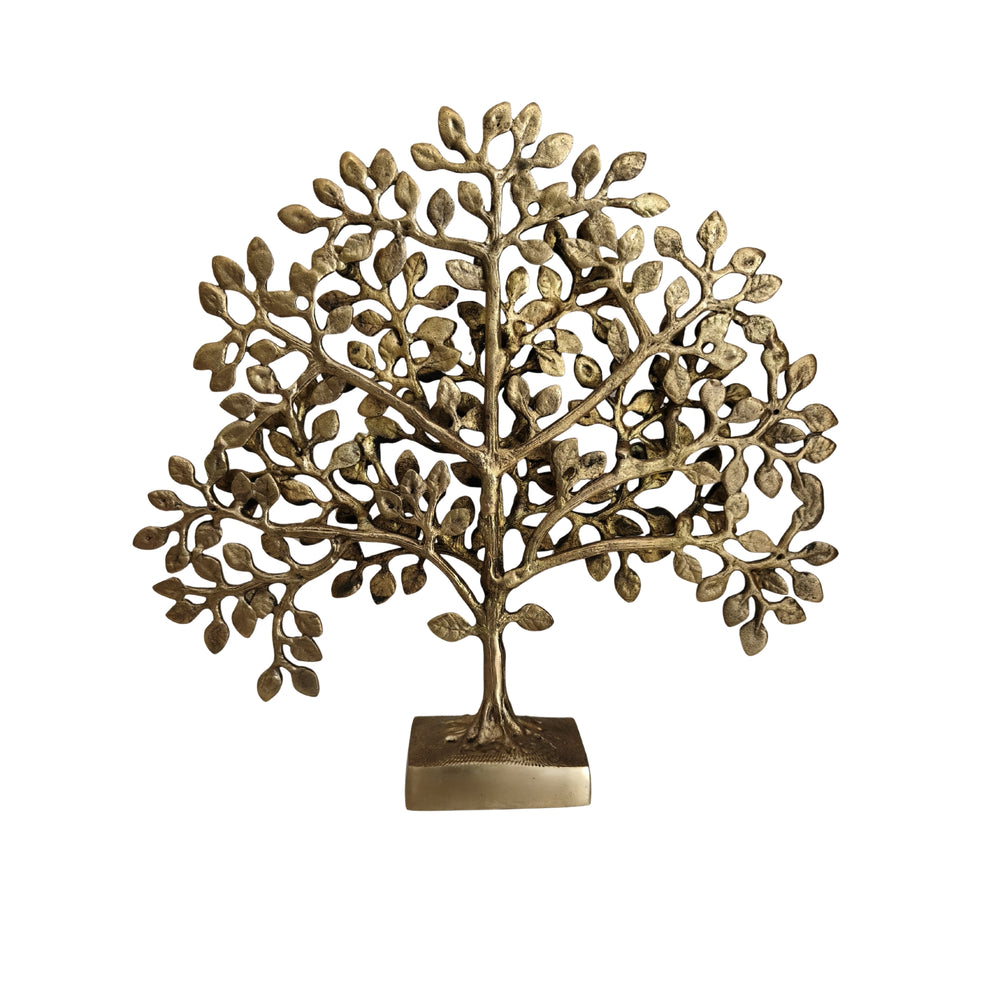 Antique brass kalpavrisham sculpture on a table, by Krafteria.
