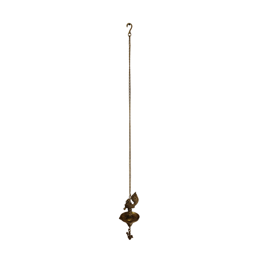 Handcrafted hanging brass oil lamp with an ornate peacock finial and a long chain for suspension.