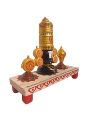 Lord Venkateswara wooden altar with golden crown, conch, and chakra wheels on a decorated base