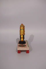 Lord Venkateswara wooden altar with golden crown, conch, and chakra wheels on a decorated base