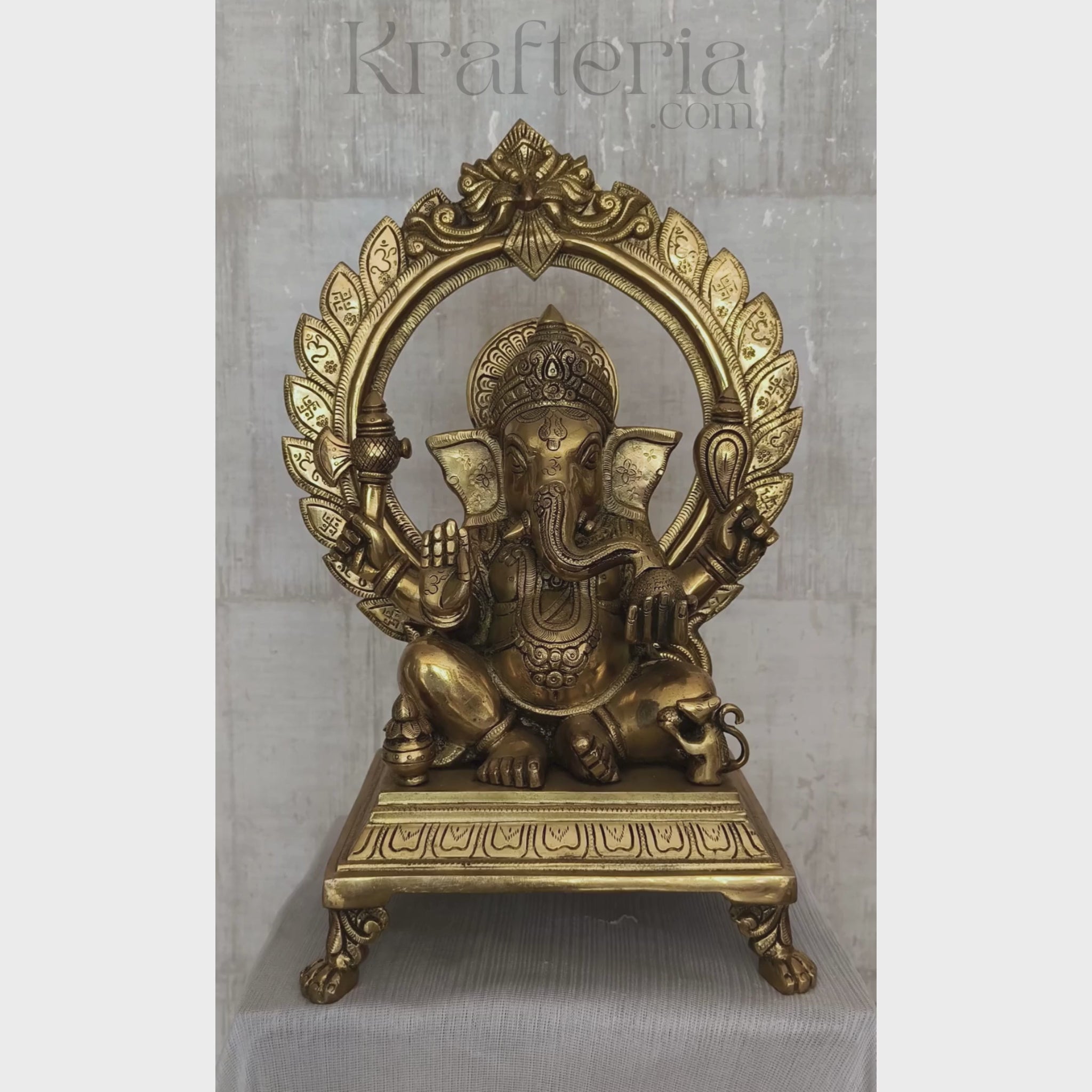Brass Lord Ganesha Idol on Pedestal with Ornate Prabhavali Arch