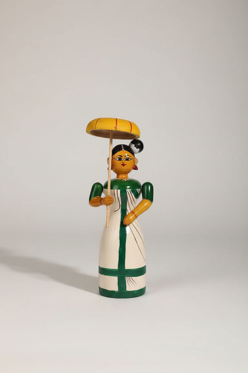 Traditional Etikoppaka wooden doll holding an umbrella, perfect for home decor.