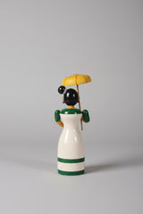 Traditional Etikoppaka wooden doll holding an umbrella, a charming piece of home decor.
